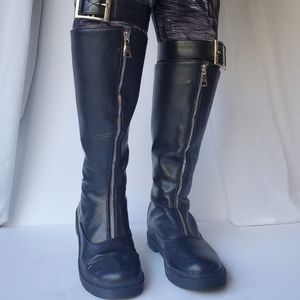 Lightly used boots. Man-made uppers, 3/4-in heel.